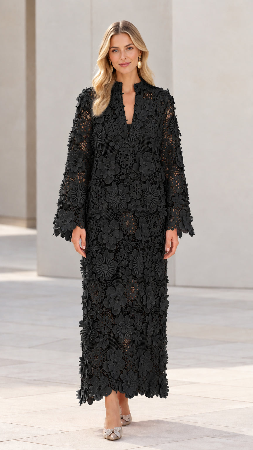 Full-length front view of woman wearing Black floral lace long sleeve maxi dress