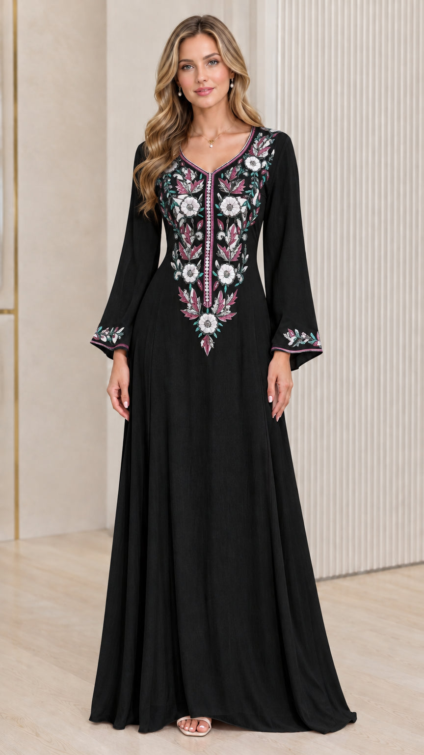 Front view of woman wearing Black floral embroidered long sleeve maxi dress