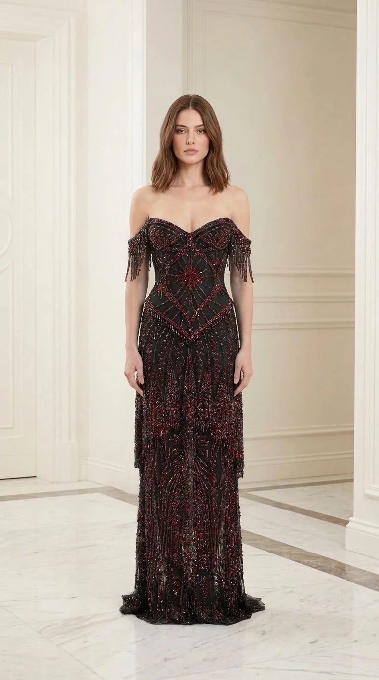 Model wearing black beaded evening gown, front view