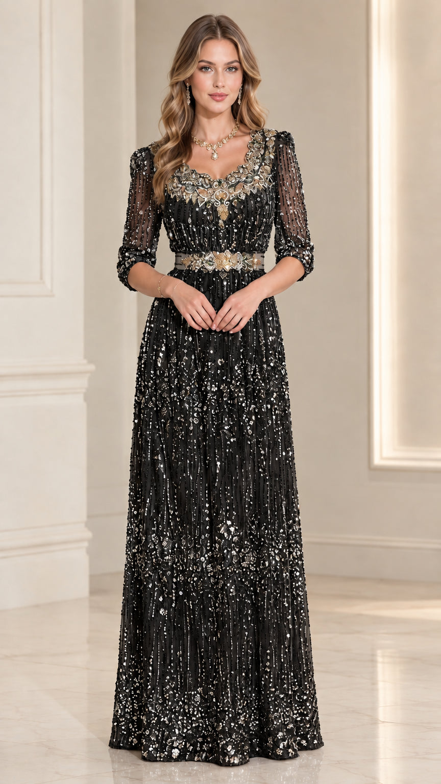 Front view of black beaded 3/4 sleeve evening gown with crystal waistband