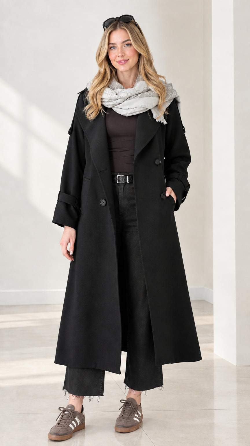 Model wearing classic black long double-breasted trench coat