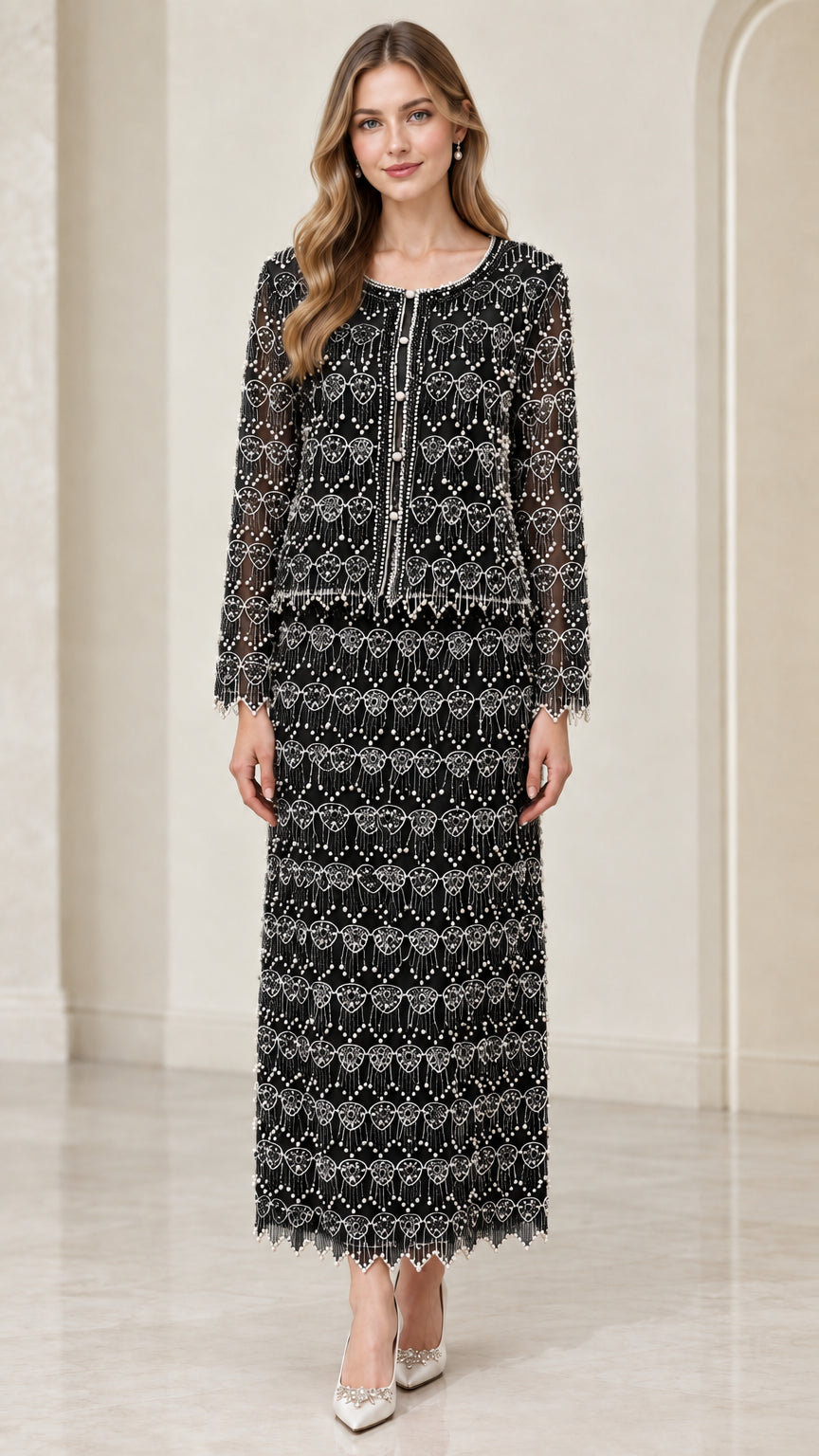Front full-length view of woman wearing black beaded two-piece maxi skirt suit