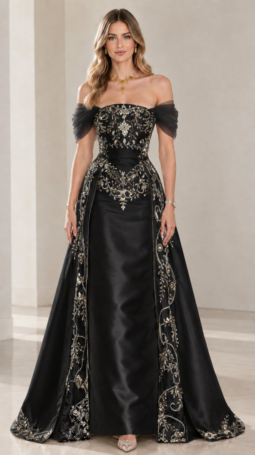 Front view of black satin off-the-shoulder evening gown with metallic gold embroidery