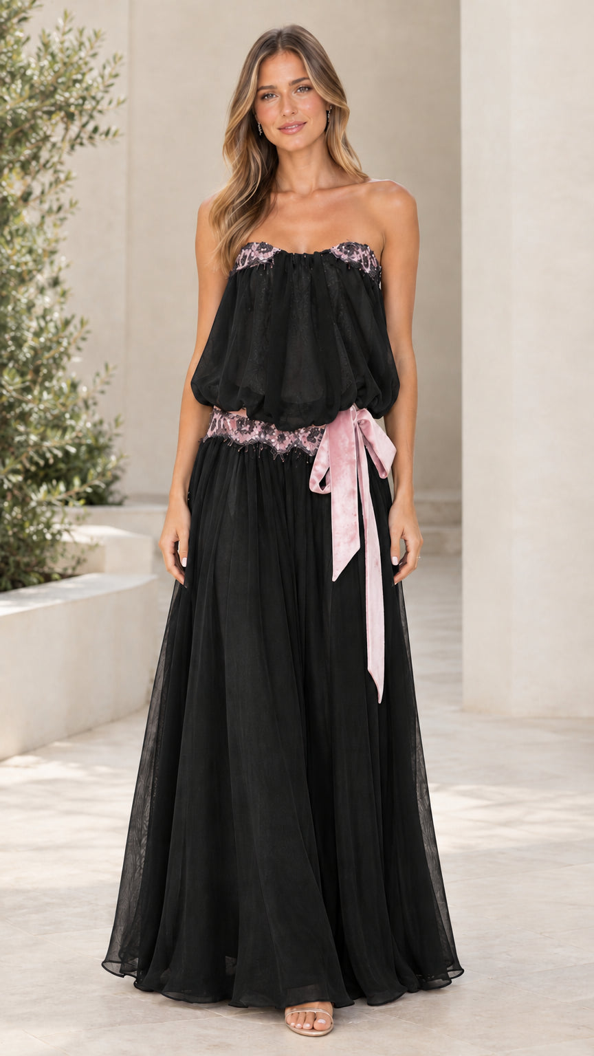 Model wearing Black strapless lace-trim blouson maxi dress