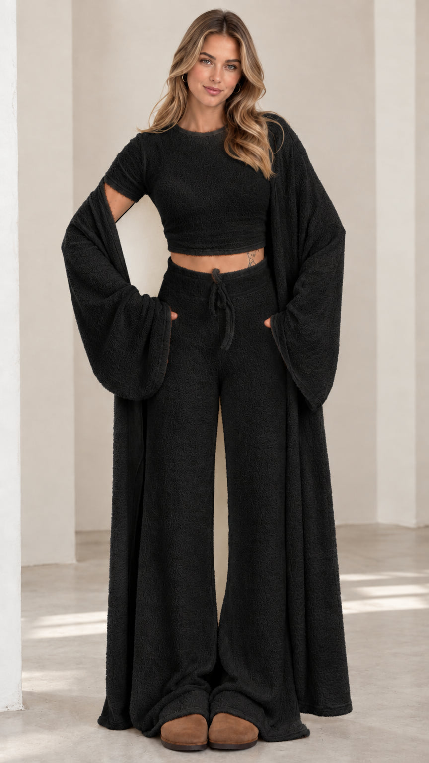 Black 3-piece plush knit lounge set with crop top, wide-leg pants, and cardigan