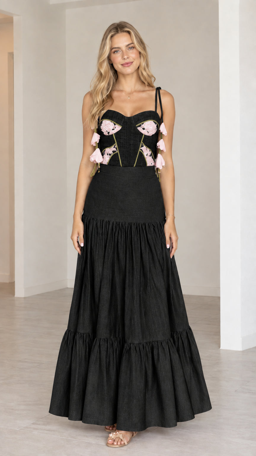 Black embroidered corset top and tiered maxi skirt set