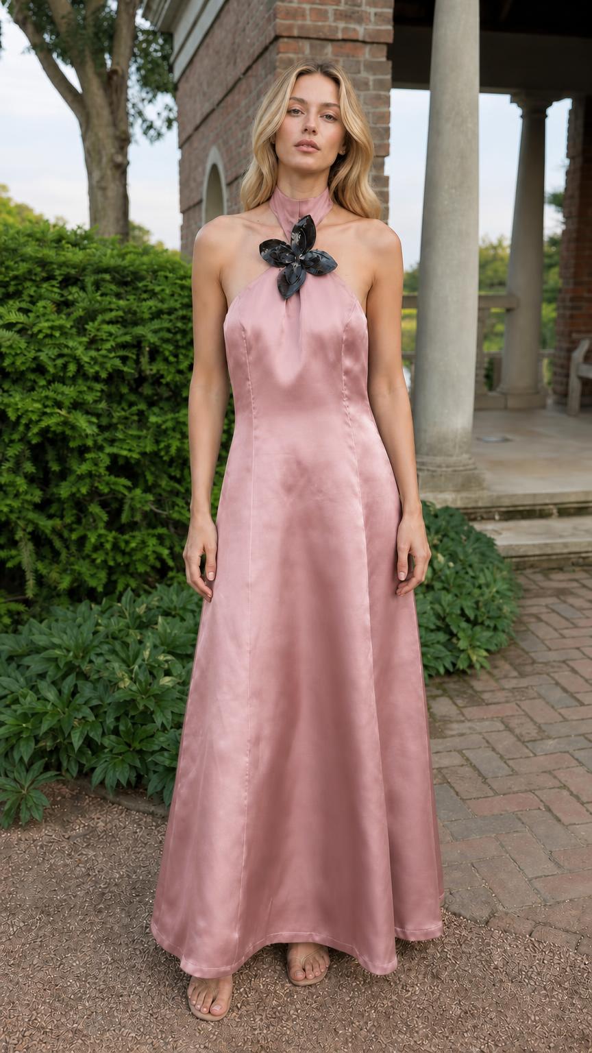 Full front view of model in pink satin halter maxi dress