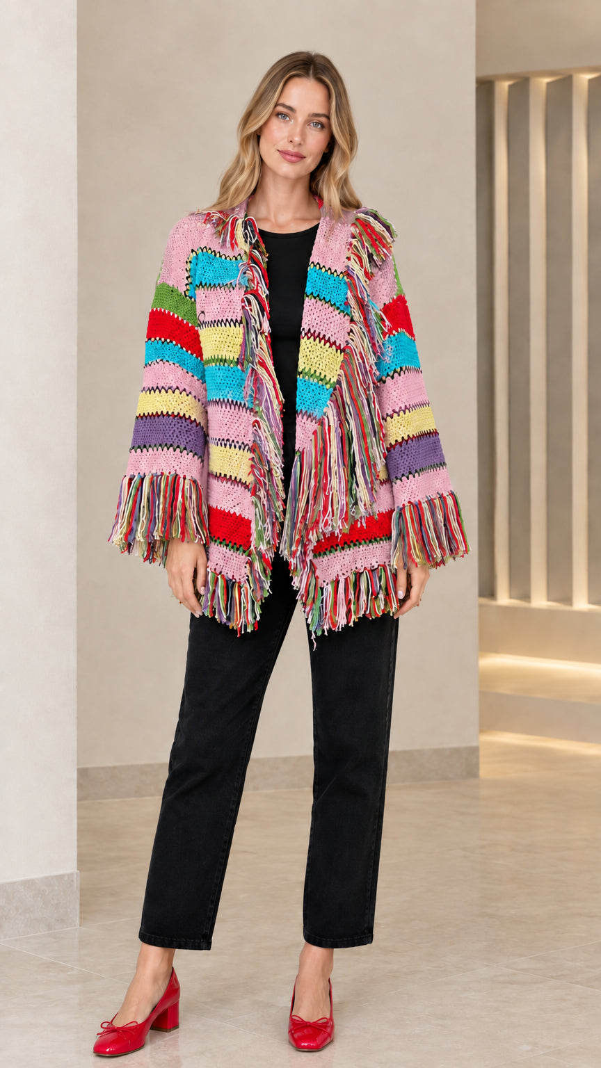 Model wearing pink multicolor striped fringe knit cardigan