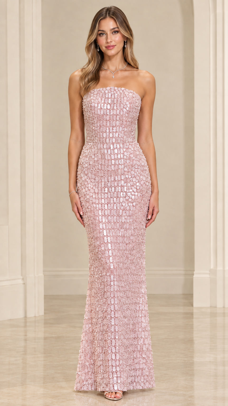 Front view of model wearing Blush Pink strapless sequin formal gown
