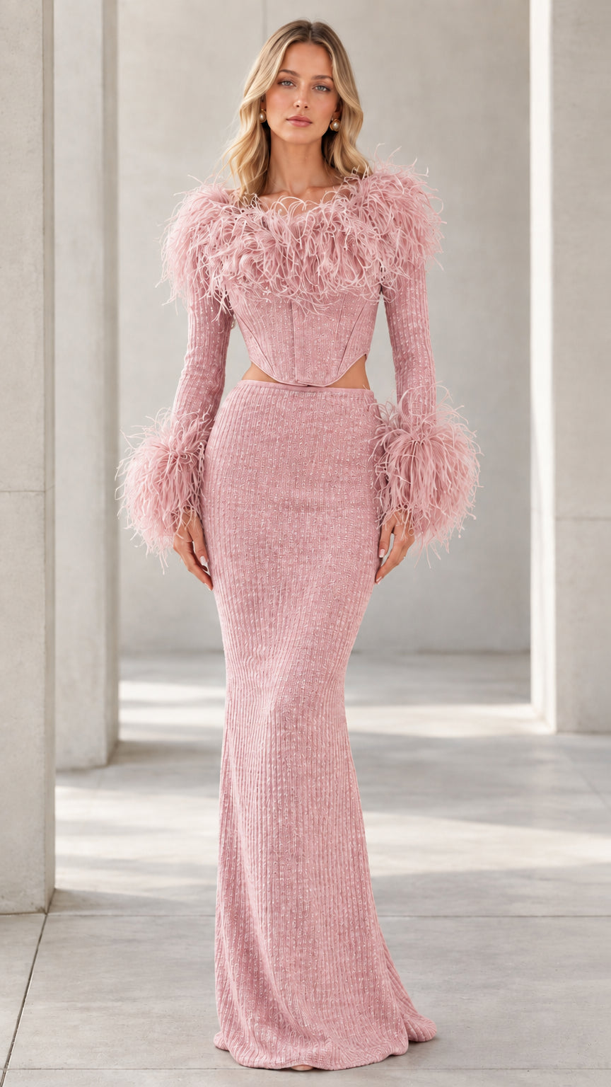 Front view of model wearing Blush Pink feather-trim corset maxi dress