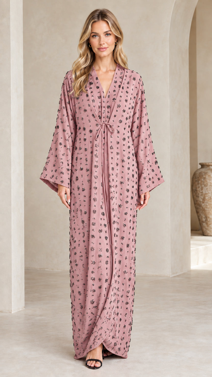 Front view of woman wearing Dusty Pink floral embellished maxi kaftan dress