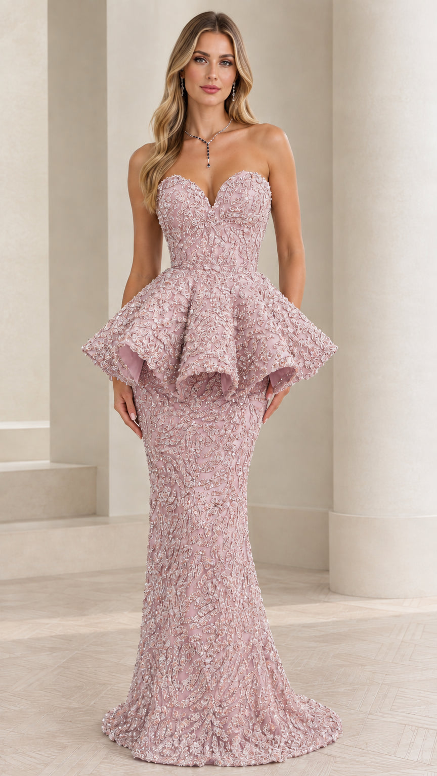 Full-length front view of the blush pink strapless peplum mermaid evening dress