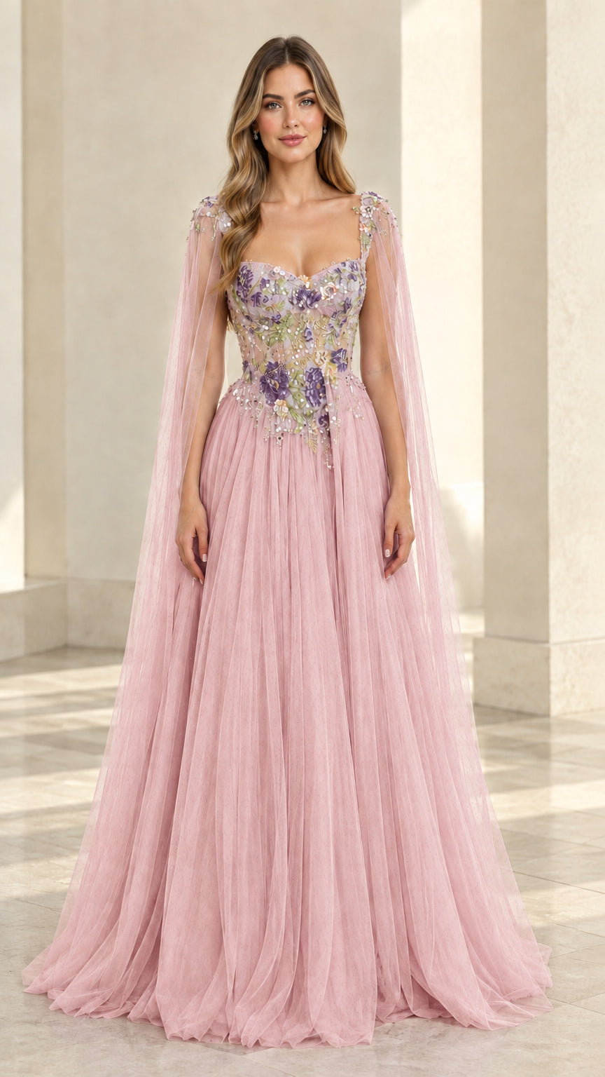 Blush pink A-line tulle formal gown with floral bodice and cape sleeves