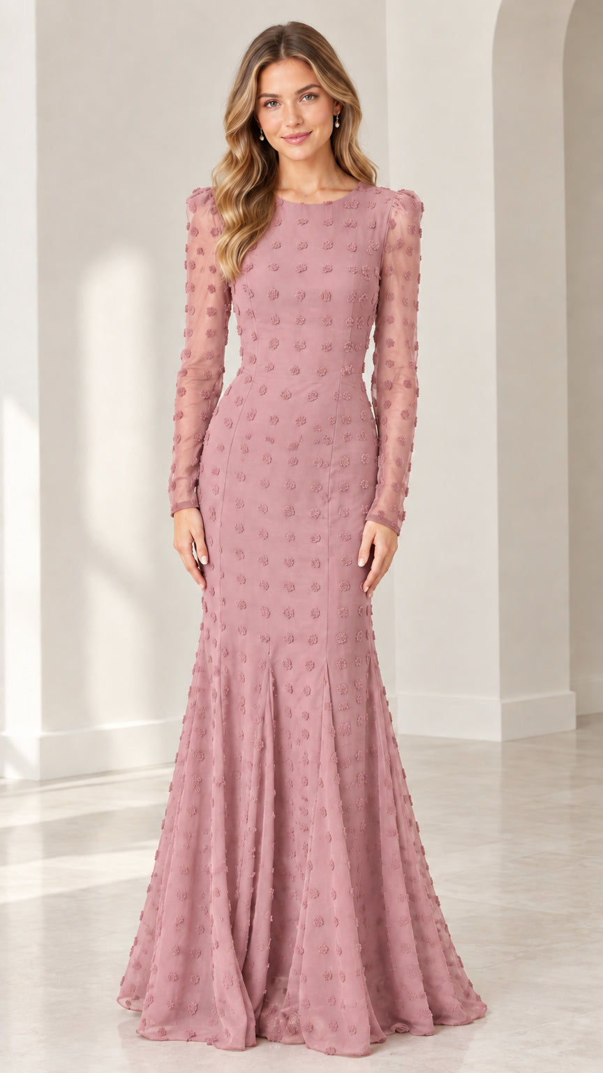 Full front view of model wearing dusty rose long sleeve swiss dot mermaid evening gown