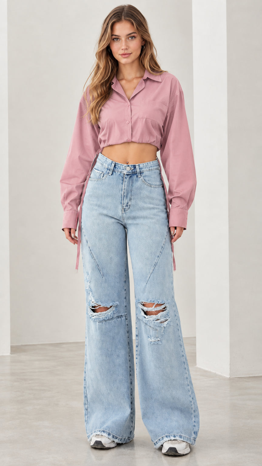 Front view of woman wearing dusty pink cropped button down long sleeve shirt
