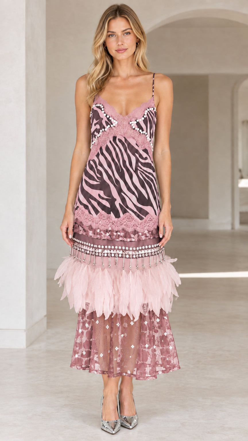 Dusty rose zebra print cami midi dress with feather trim on model