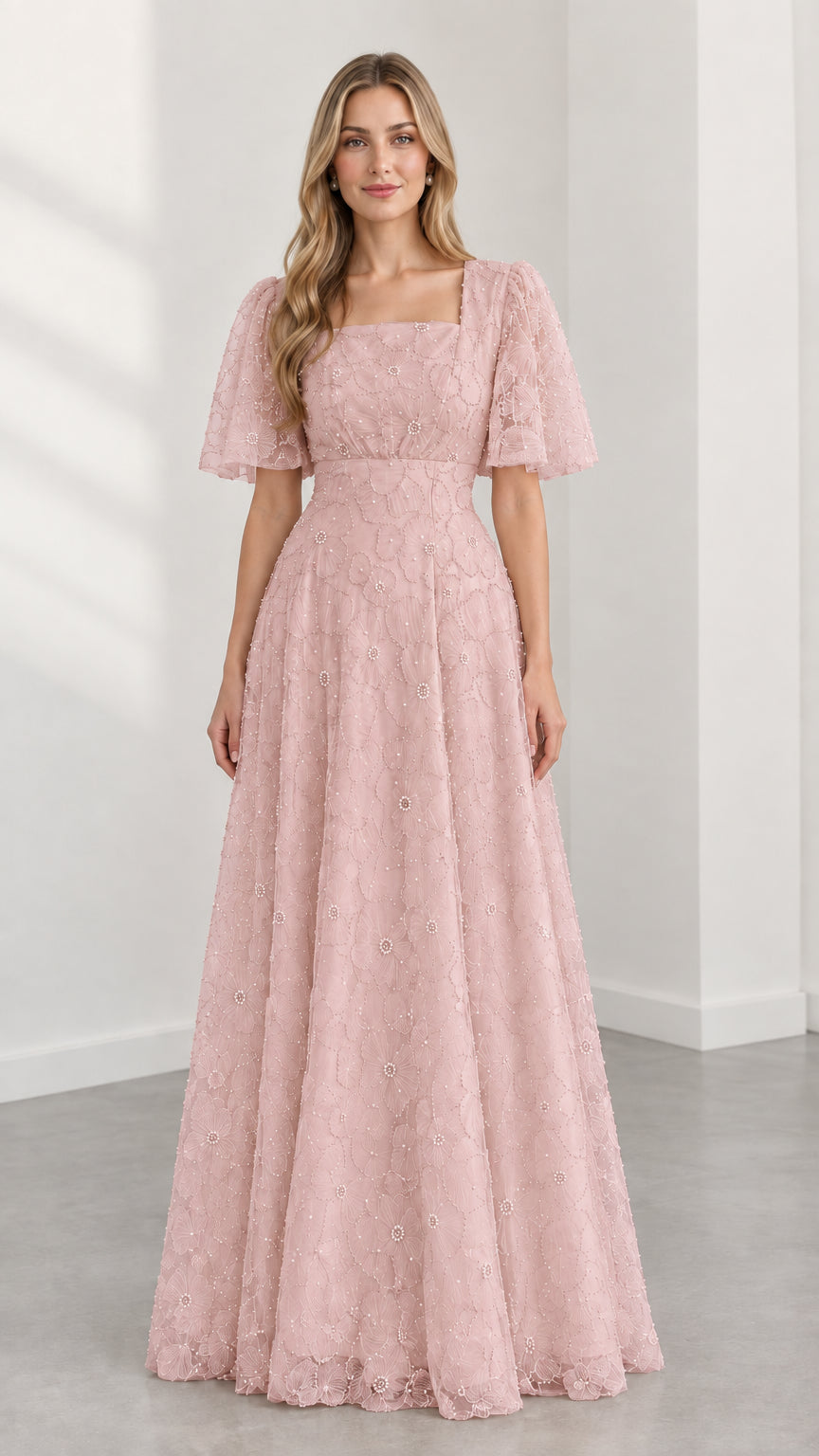 Full-length blush pink embroidered lace flutter sleeve A-line maxi dress
