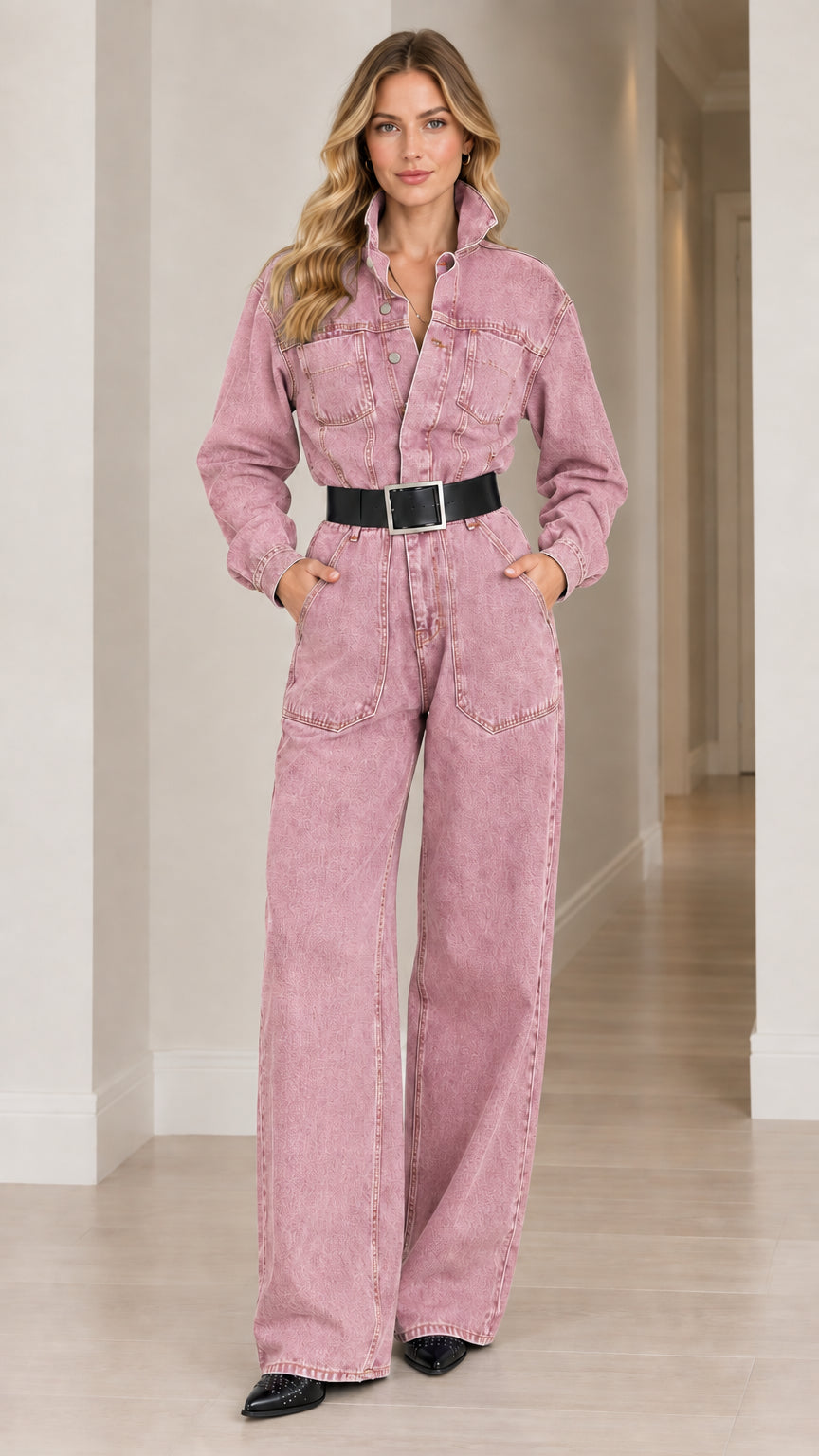 Full-length view of woman wearing dusty pink belted denim wide leg jumpsuit