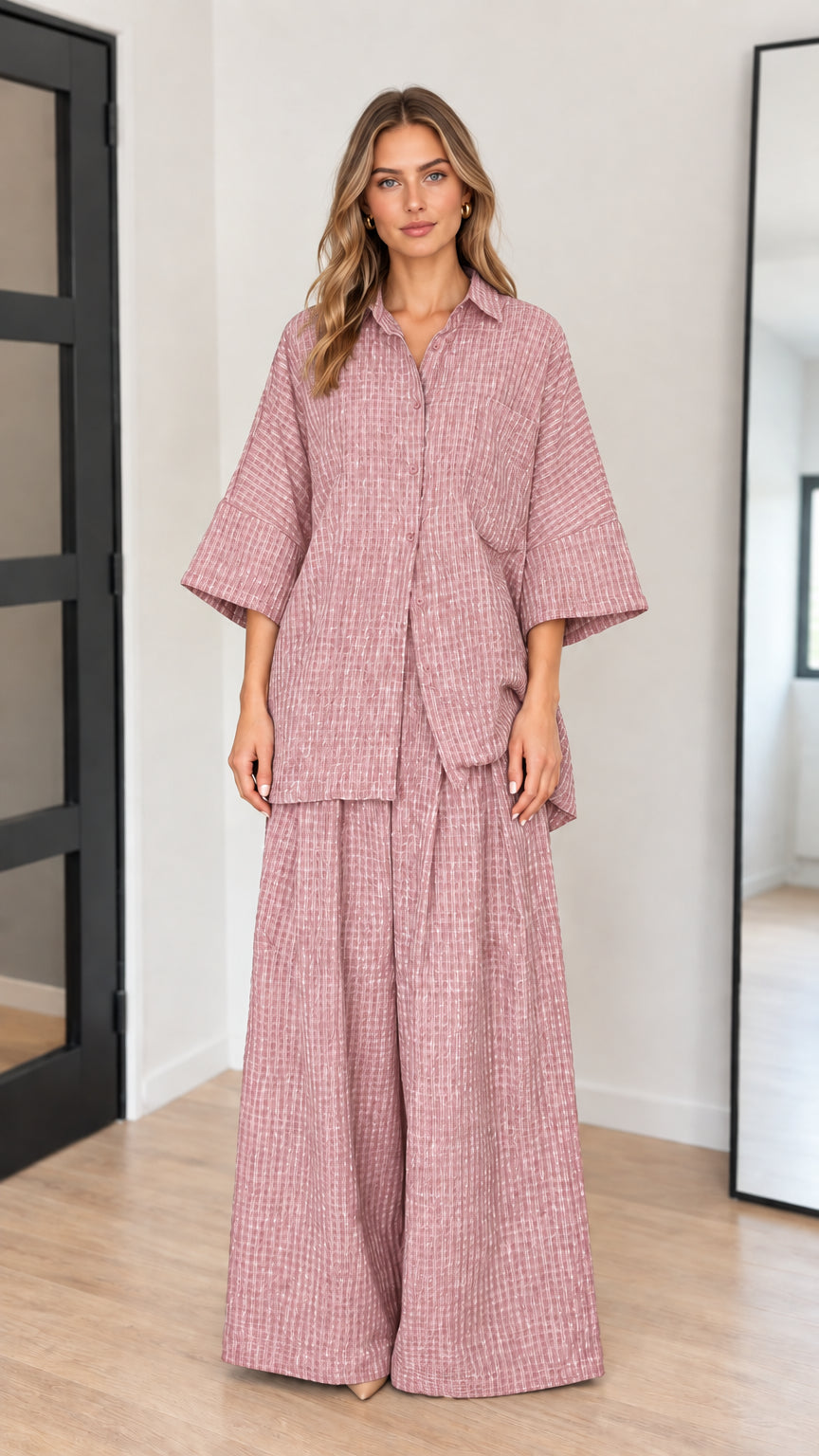 Front view of model wearing dusty rose pink textured two-piece set