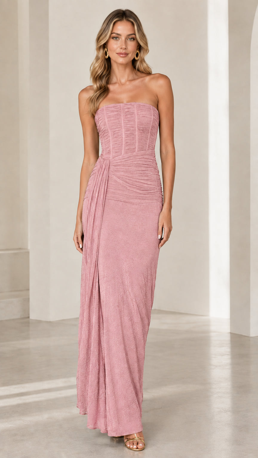 Full front view of dusty pink strapless ruched corset maxi dress