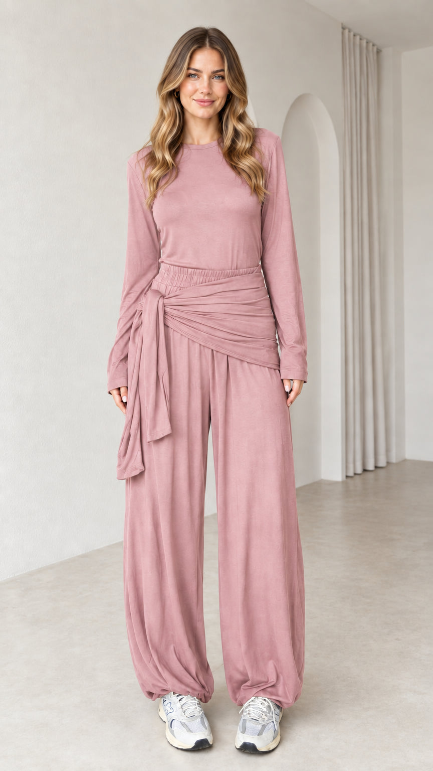 Front view of woman wearing dusty rose 2-piece long sleeve draped tie lounge set