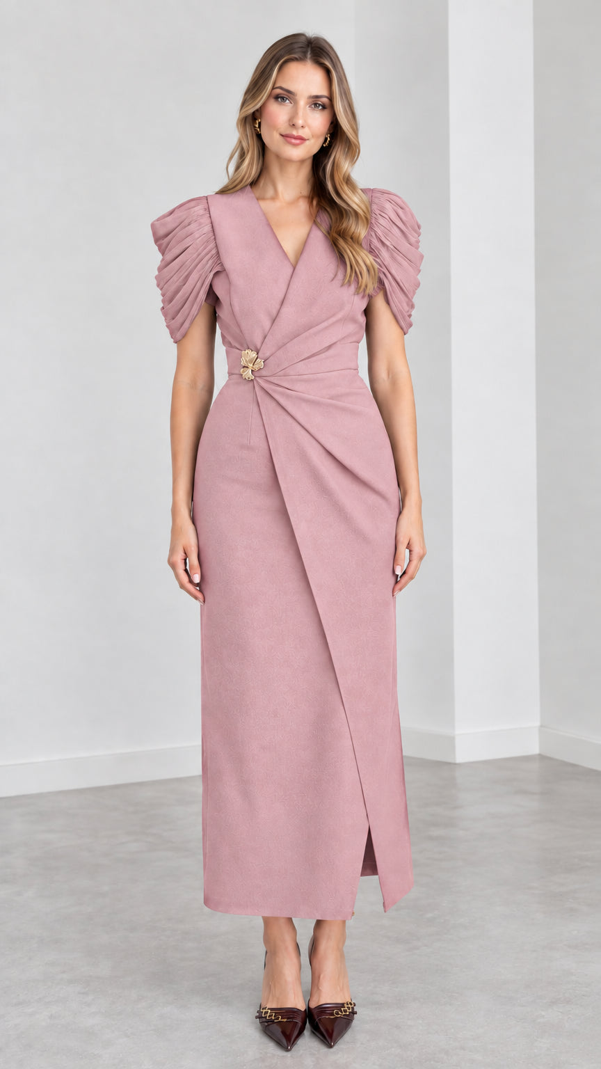Front view of woman wearing Dusty Pink tailored evening maxi dress with brooch detail