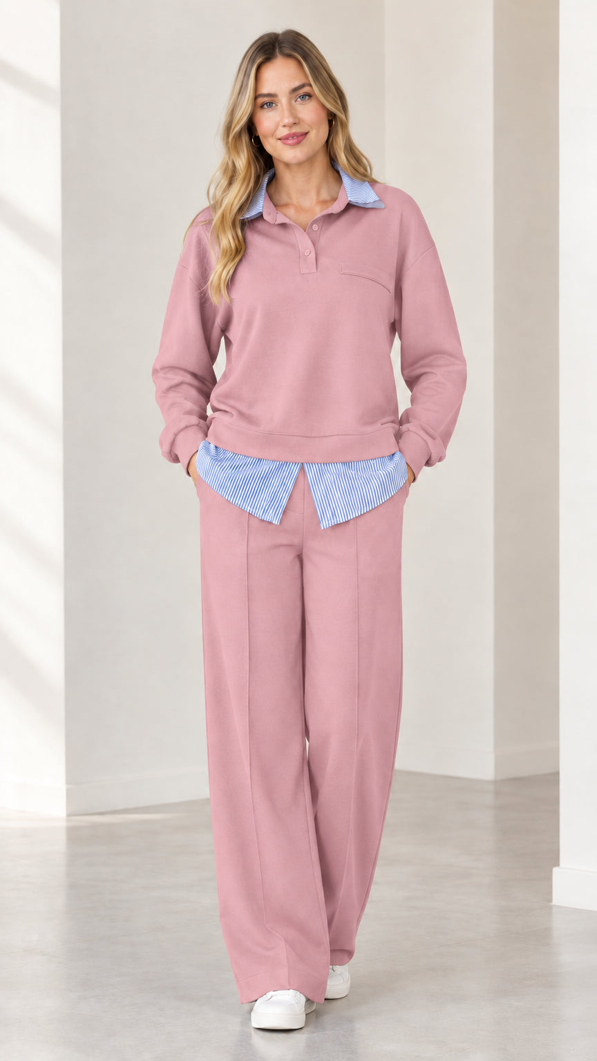 Full-body view of woman wearing dusty pink 2-piece layered lounge set