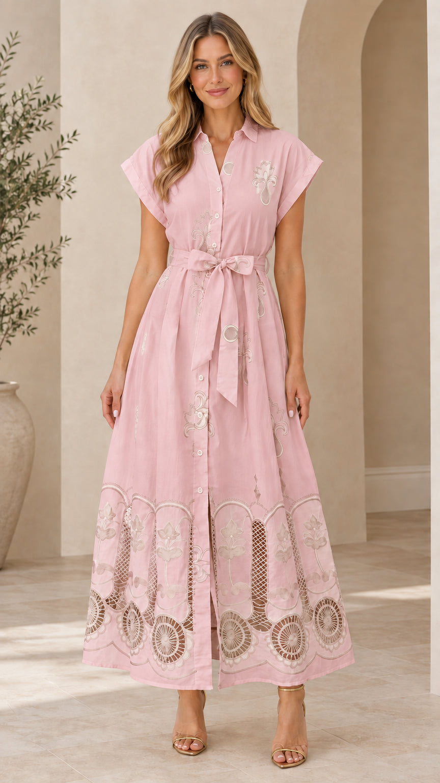 Front view of light pink embroidered cap-sleeve maxi shirt dress with waist tie