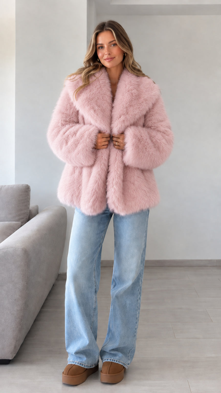 Front view of model wearing dusty pink plush faux fur lapel jacket