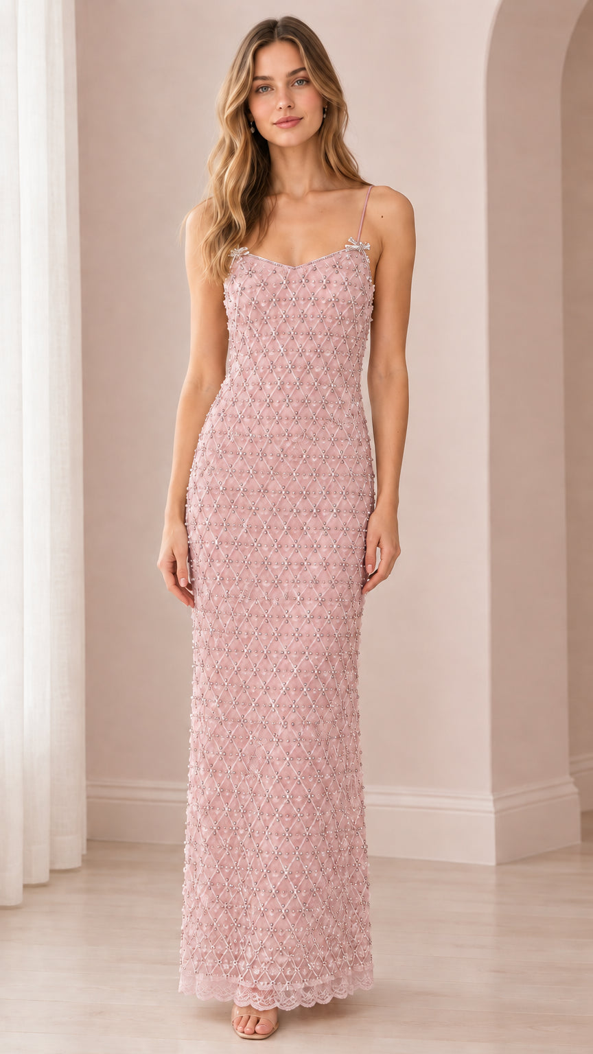Dusty pink beaded formal evening gown on model