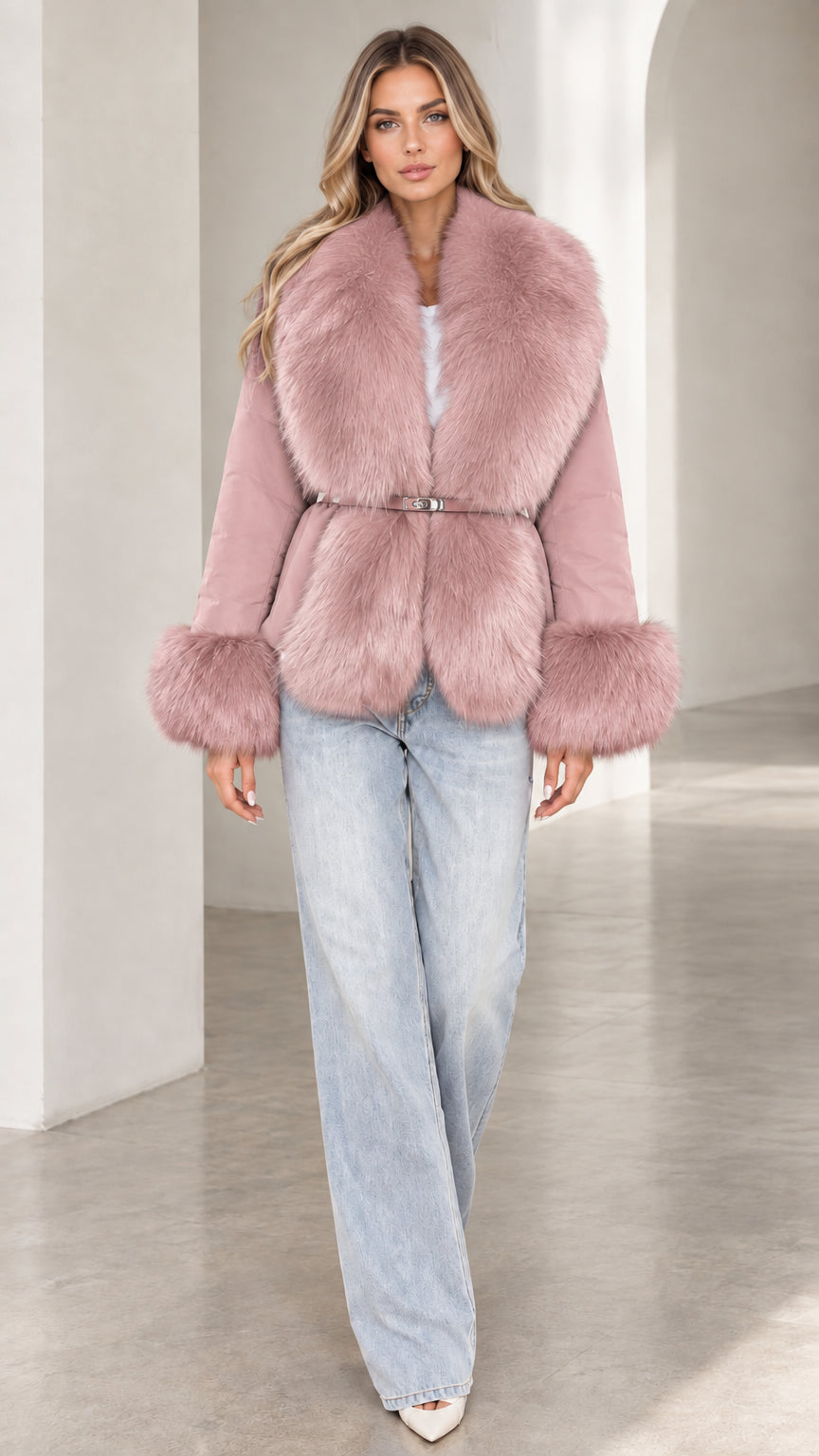 Model wearing dusty pink belted winter jacket with plush faux fur trim
