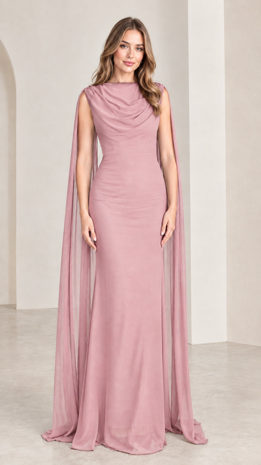 Model wearing soft dusty rose pink cape sleeve formal maxi dress