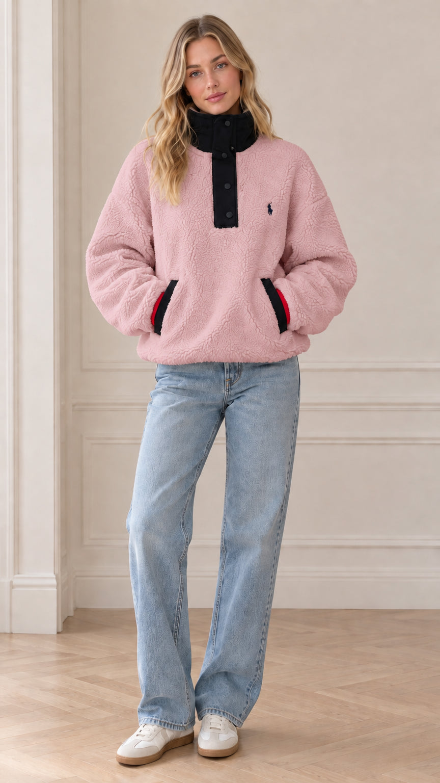 Front view of model wearing pastel pink sherpa fleece snap-neck pullover
