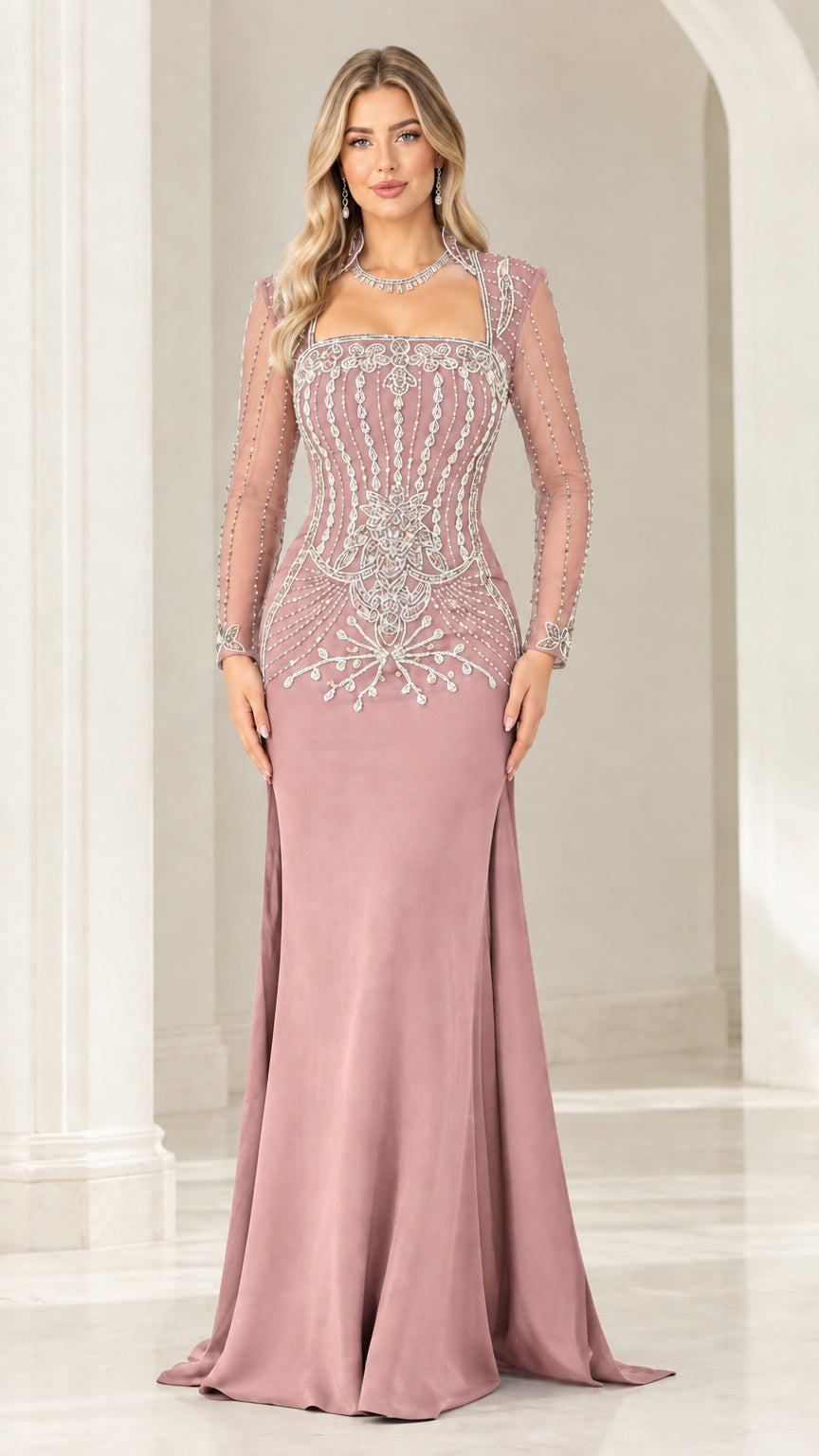 Front full-length view of dusty rose pink embellished long sleeve formal gown