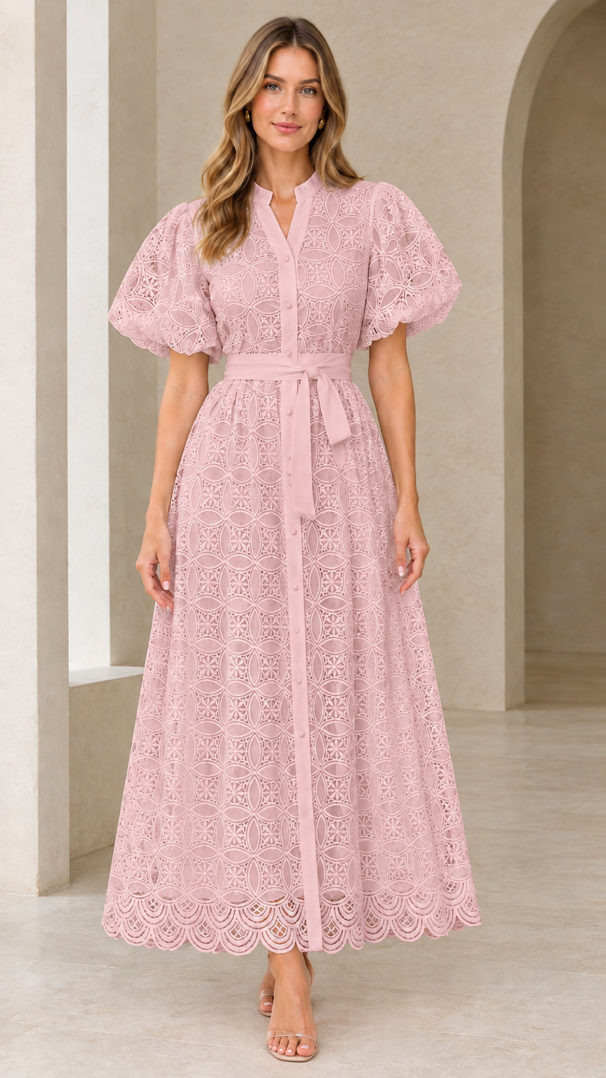 Front view of model wearing blush pink embroidered lace puff sleeve maxi dress