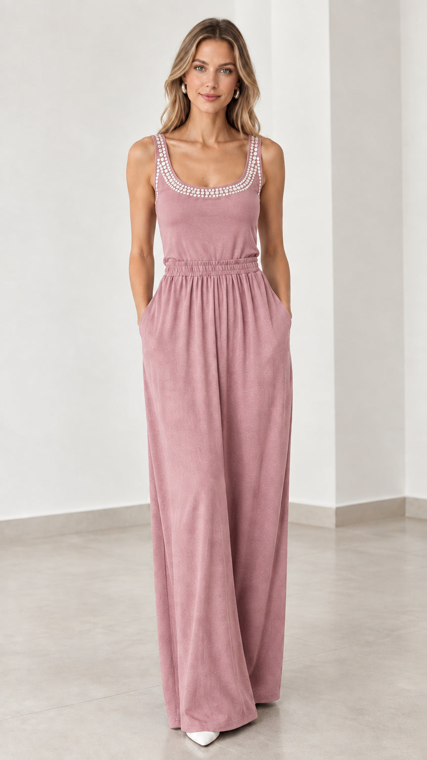 Front view of model wearing dusty pink rhinestone scoop neck wide leg jumpsuit