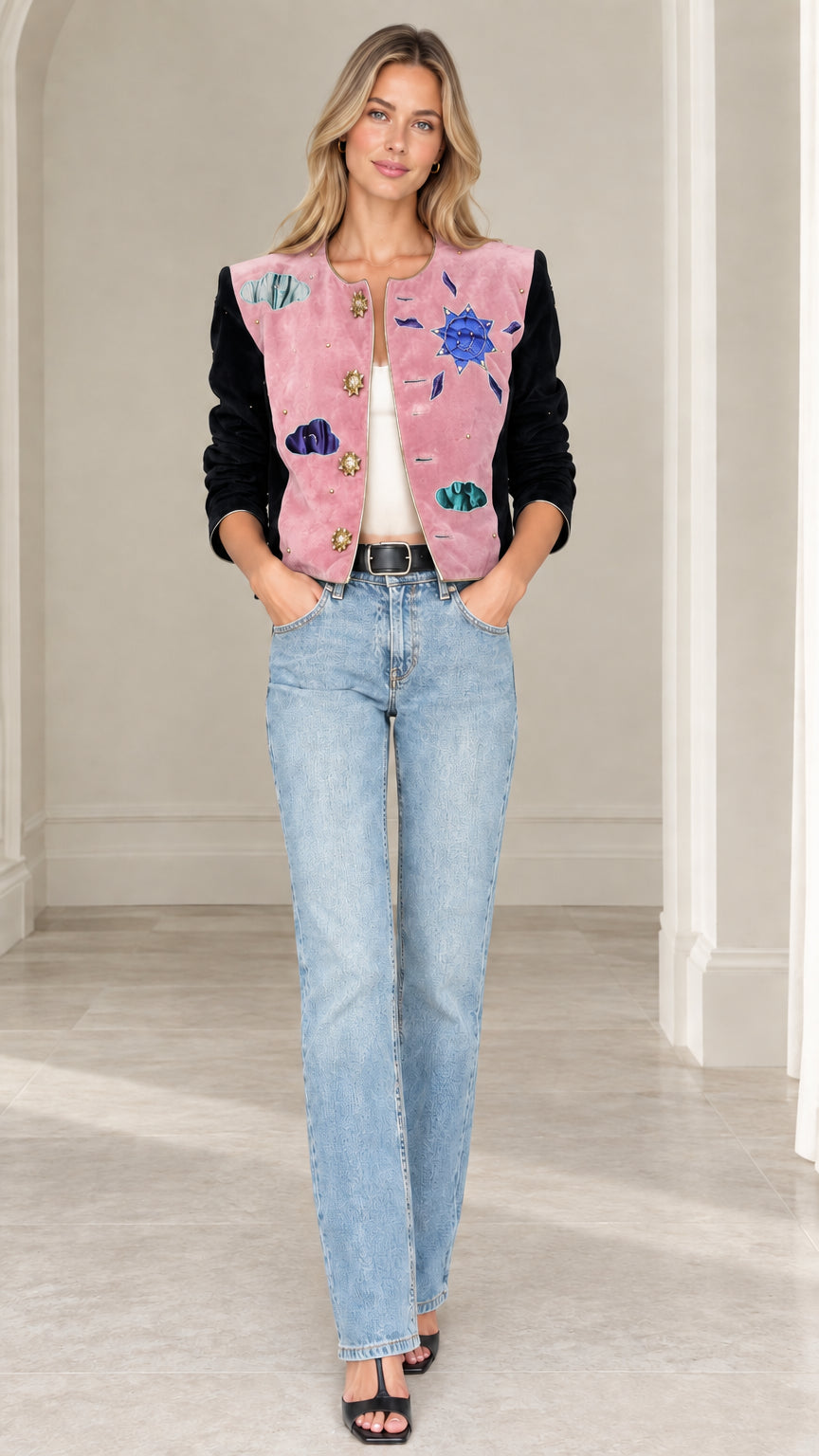 Model wearing pink celestial applique cropped jacket with black velvet sleeves