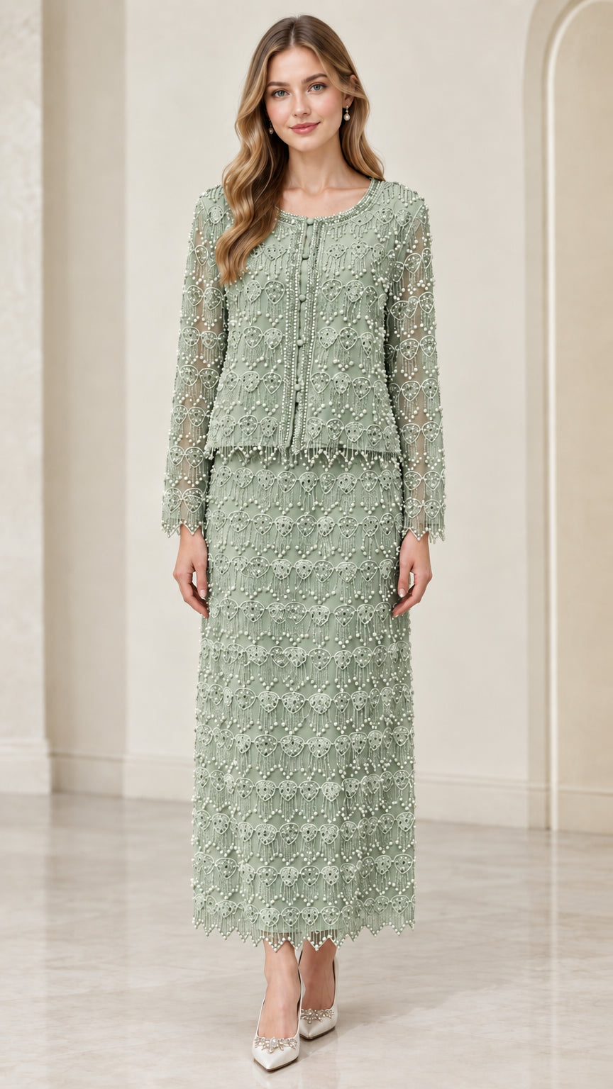 Front full-length view of woman wearing sage green beaded two-piece maxi skirt suit