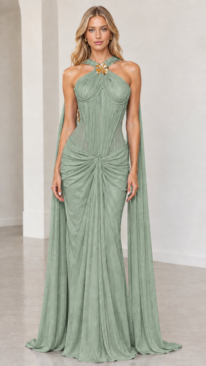 Front view of sage green halter corset evening gown with waist draping