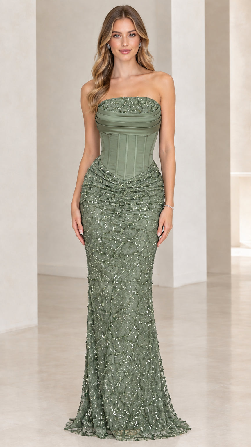 Front view of woman wearing sage green strapless corset sequin evening gown