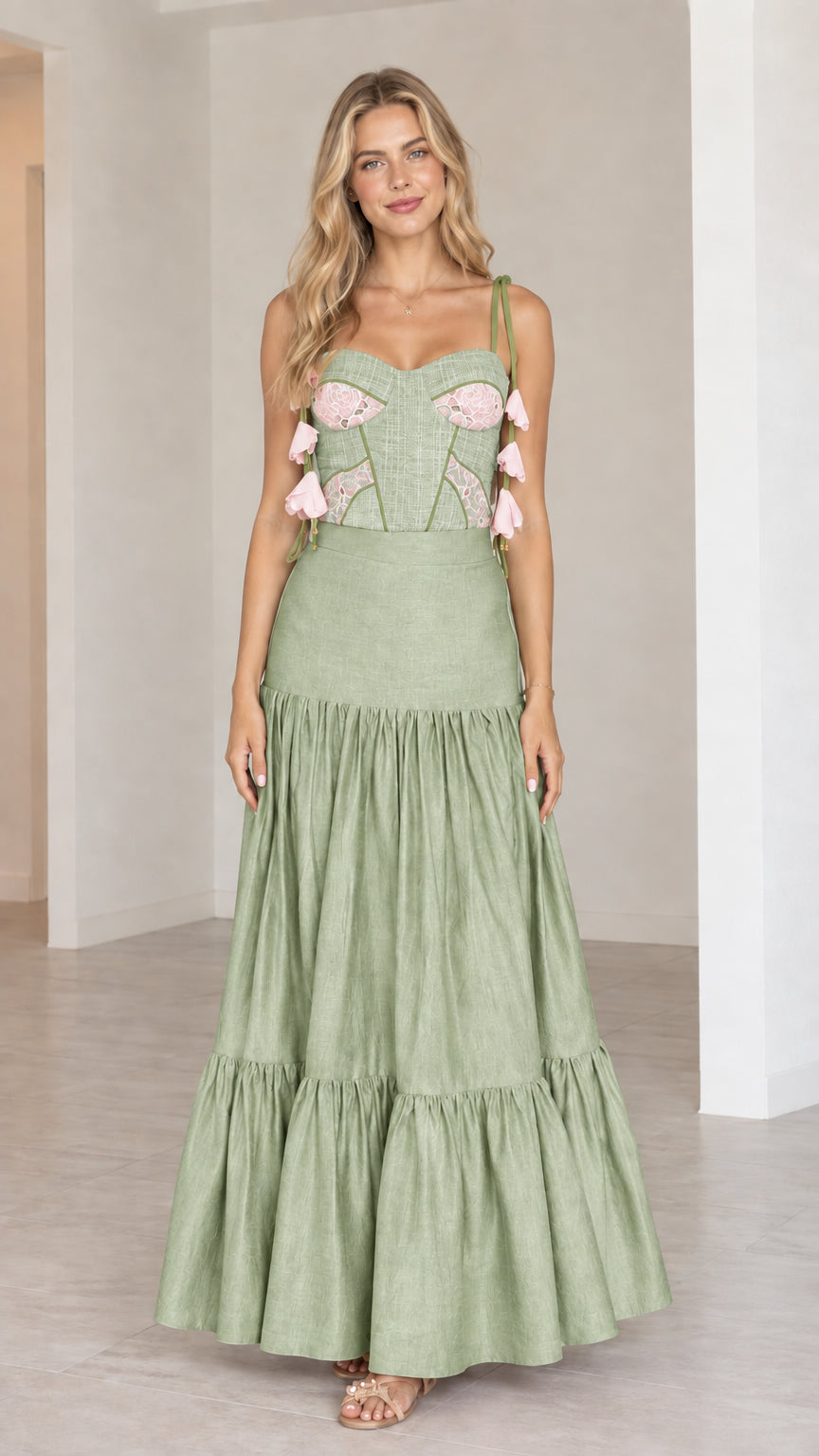 Sage green two-piece corset bustier and tiered maxi skirt