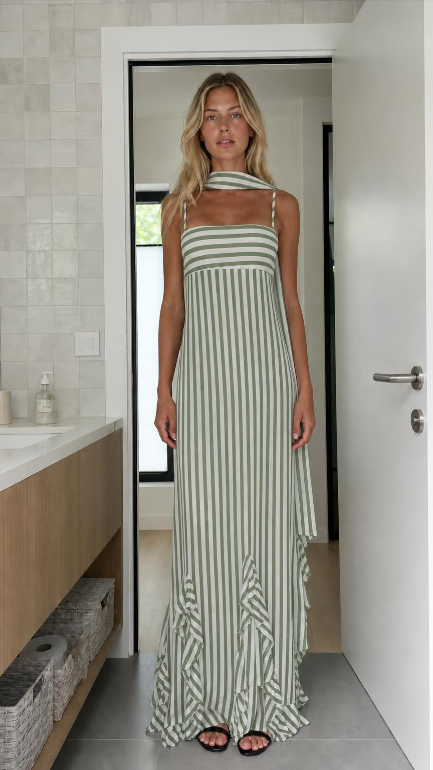 Model wearing sage green and white striped maxi dress