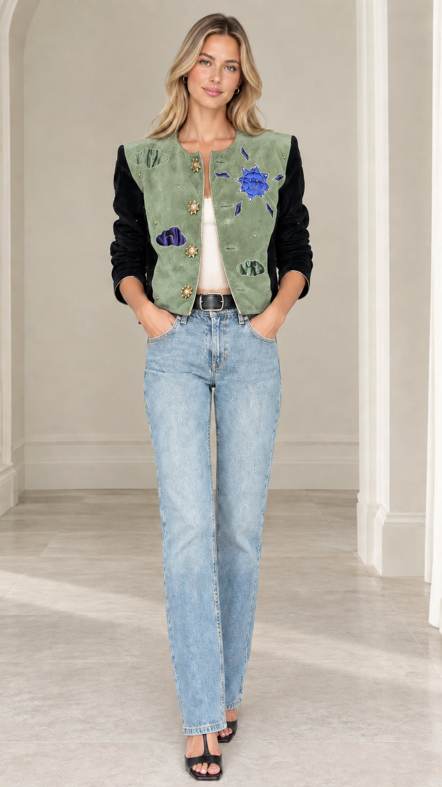 Model wearing sage green celestial applique cropped jacket with black velvet sleeves