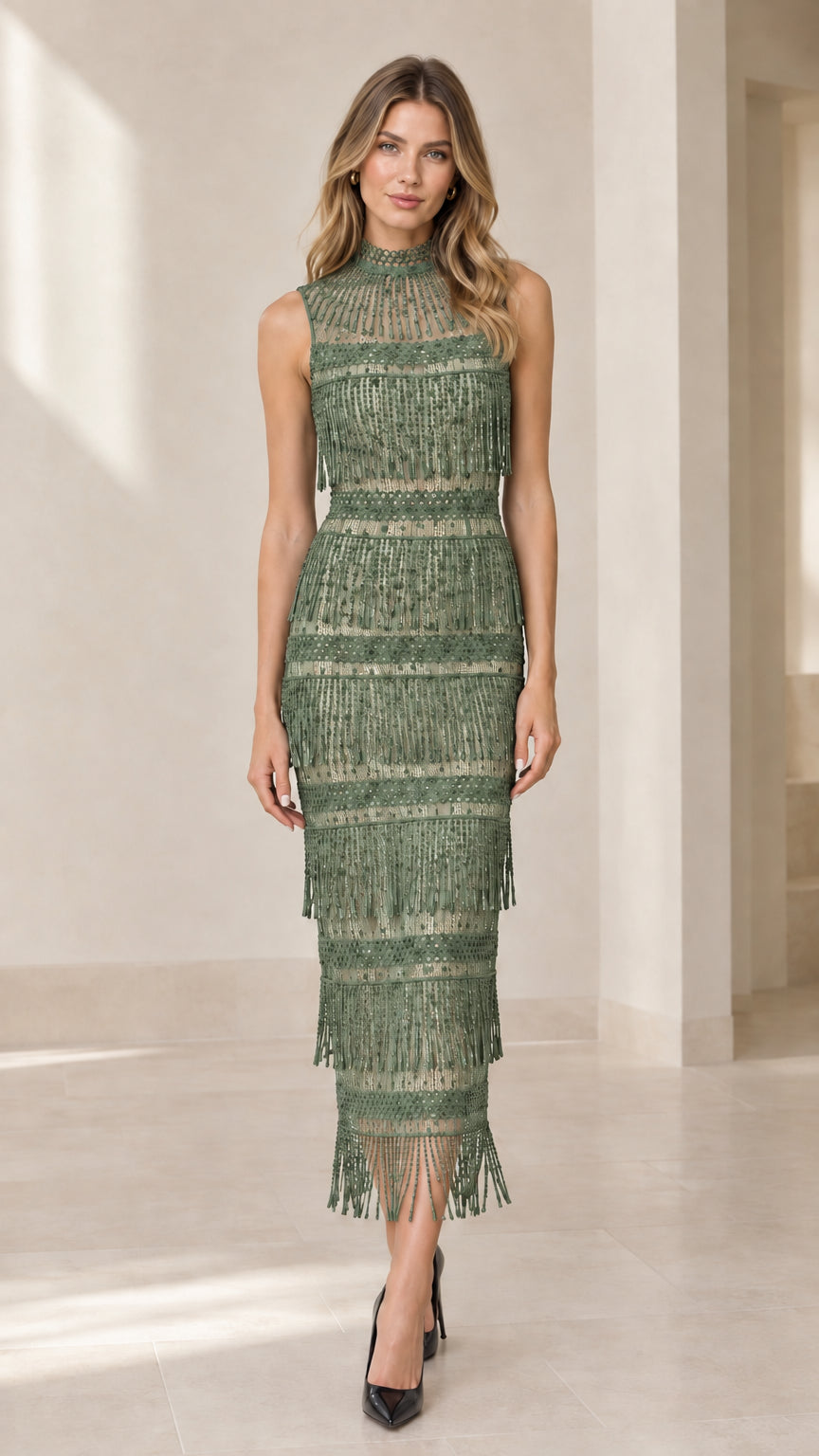 Front view of model wearing sage green tiered beaded fringe midi dress
