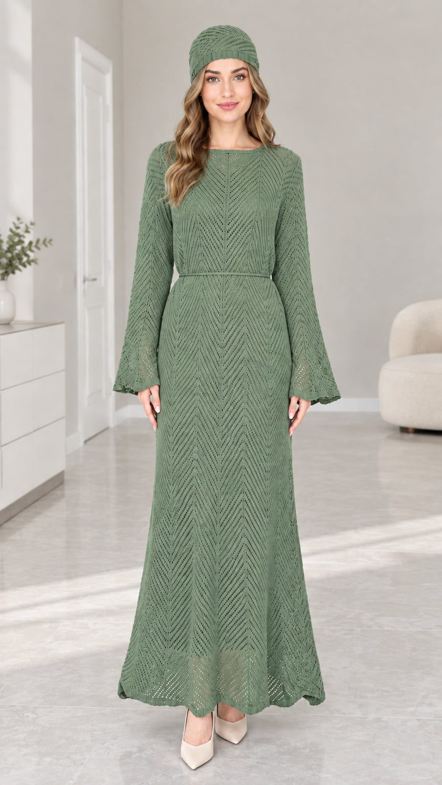 Front view of woman wearing Sage Green chevron knit maxi dress