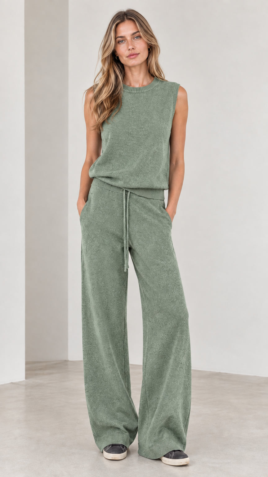 Full-body view of woman wearing Sage Green sleeveless top and wide-leg knit pants set