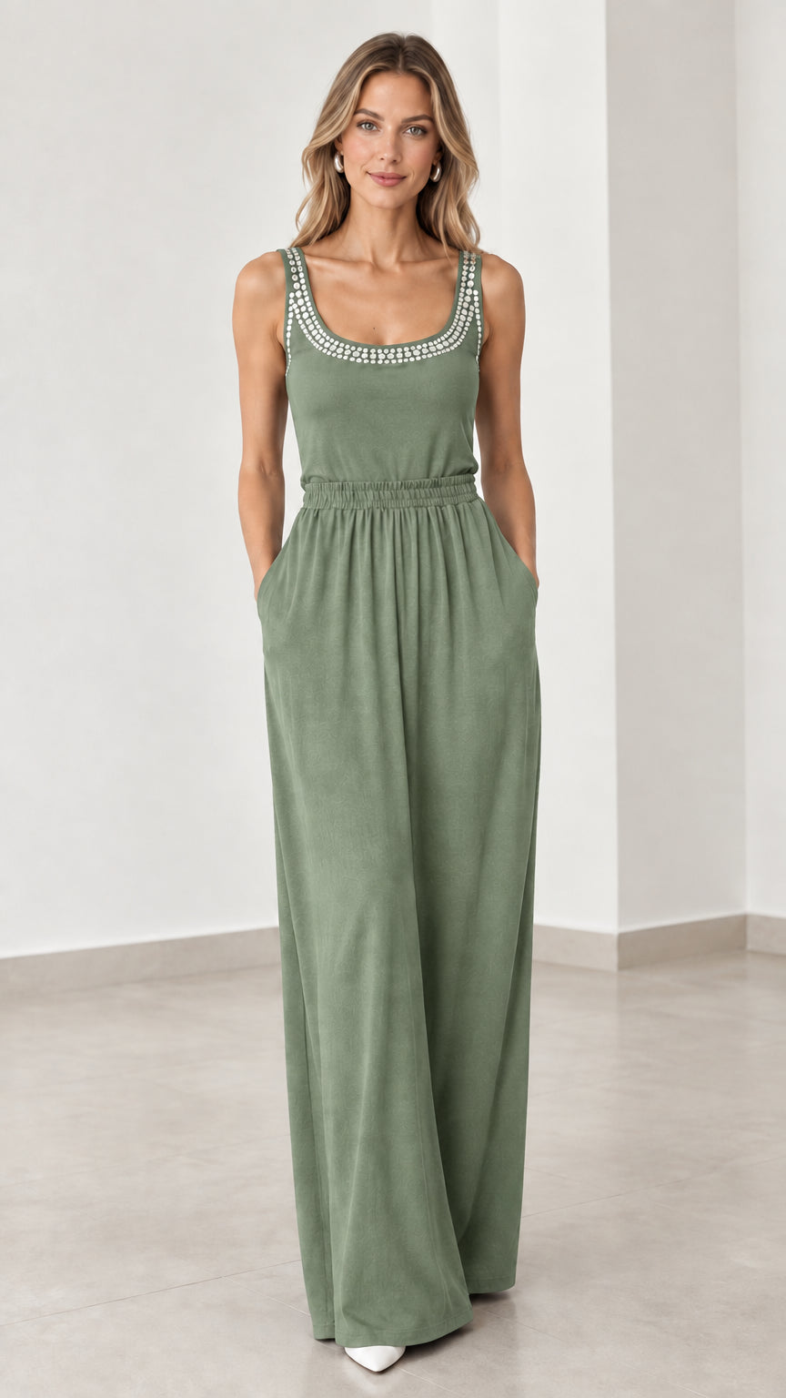 Front view of model wearing sage green rhinestone scoop neck wide leg jumpsuit