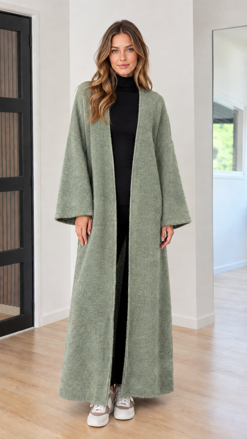 Model wearing sage green longline open-front knit maxi duster cardigan