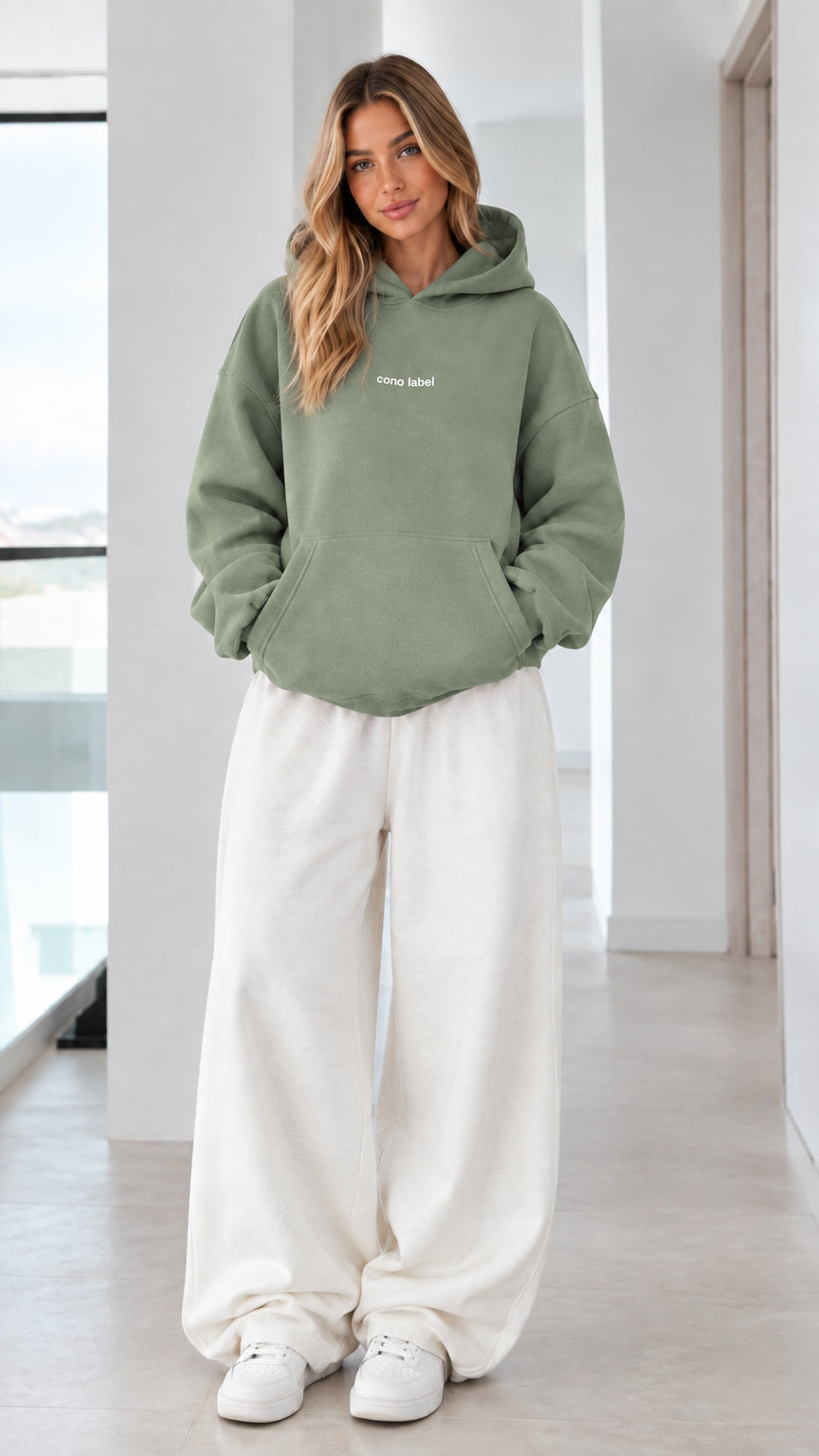 Women's sage green oversized hoodie sweatshirt on model