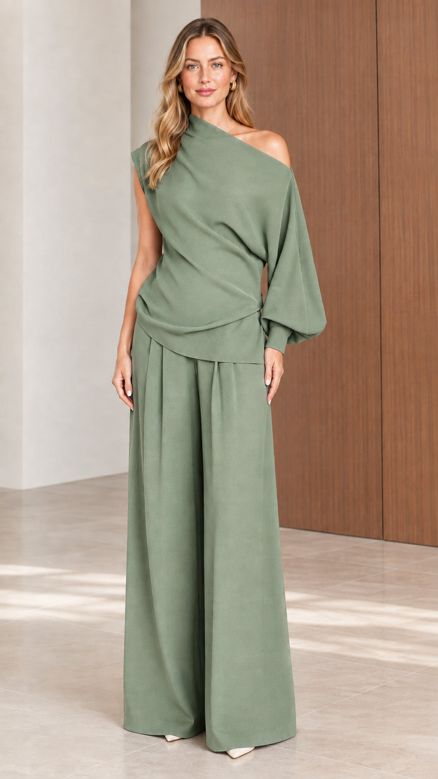 Front view of model wearing Sage Green asymmetrical one-shoulder pant set